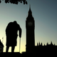 A statue of Winston Churchill is silhouetted against the Houses of Parliament and the early morning sky in London, Friday, June 24, 2016. (Associated Press)